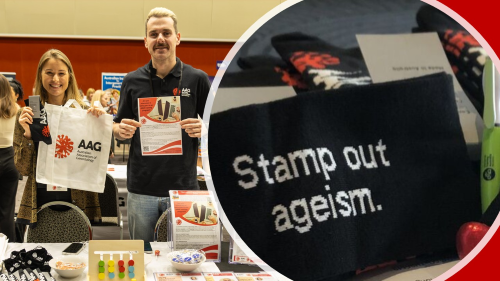 Image of AAG merchandise table and staff at AAGConf25 with a close up of the stamp out ageism socks for sale